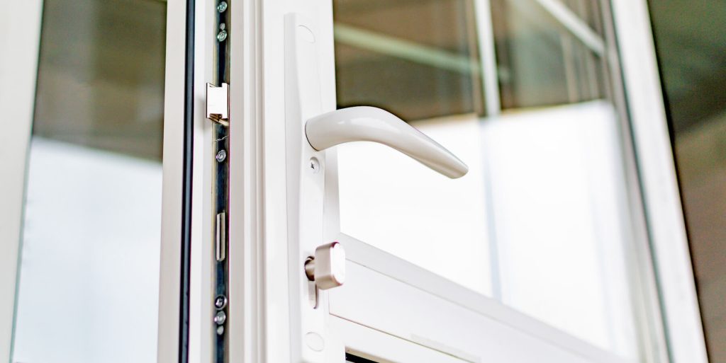 White uPVC back door handle