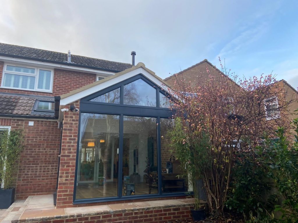 black orangery with bifold door