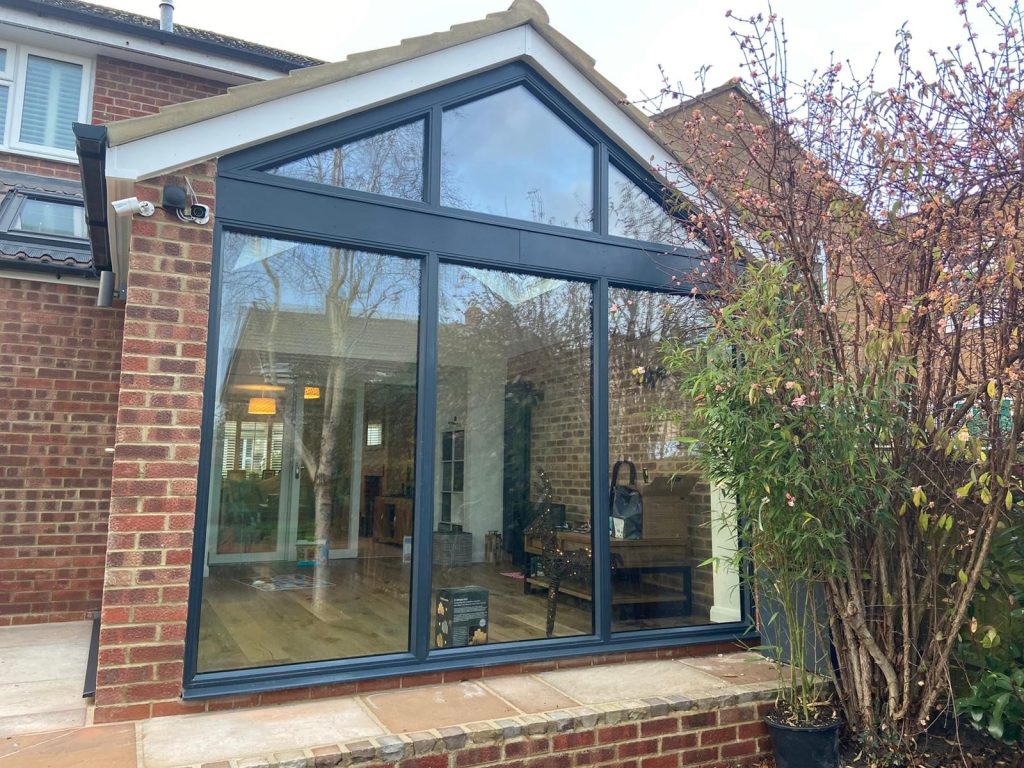 black orangery with bifold door